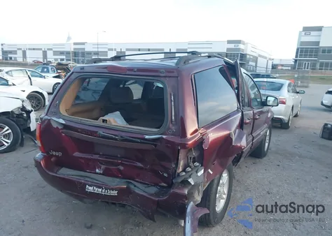 2000 Jeep Grand Cherokee Limited from USA, damaged, VIN 1J4GW58N2YC284603